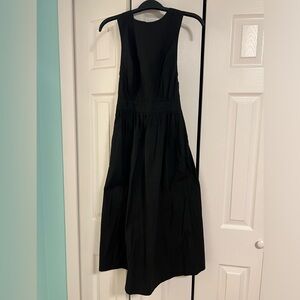 BNWT classic black dress with cross back, size S